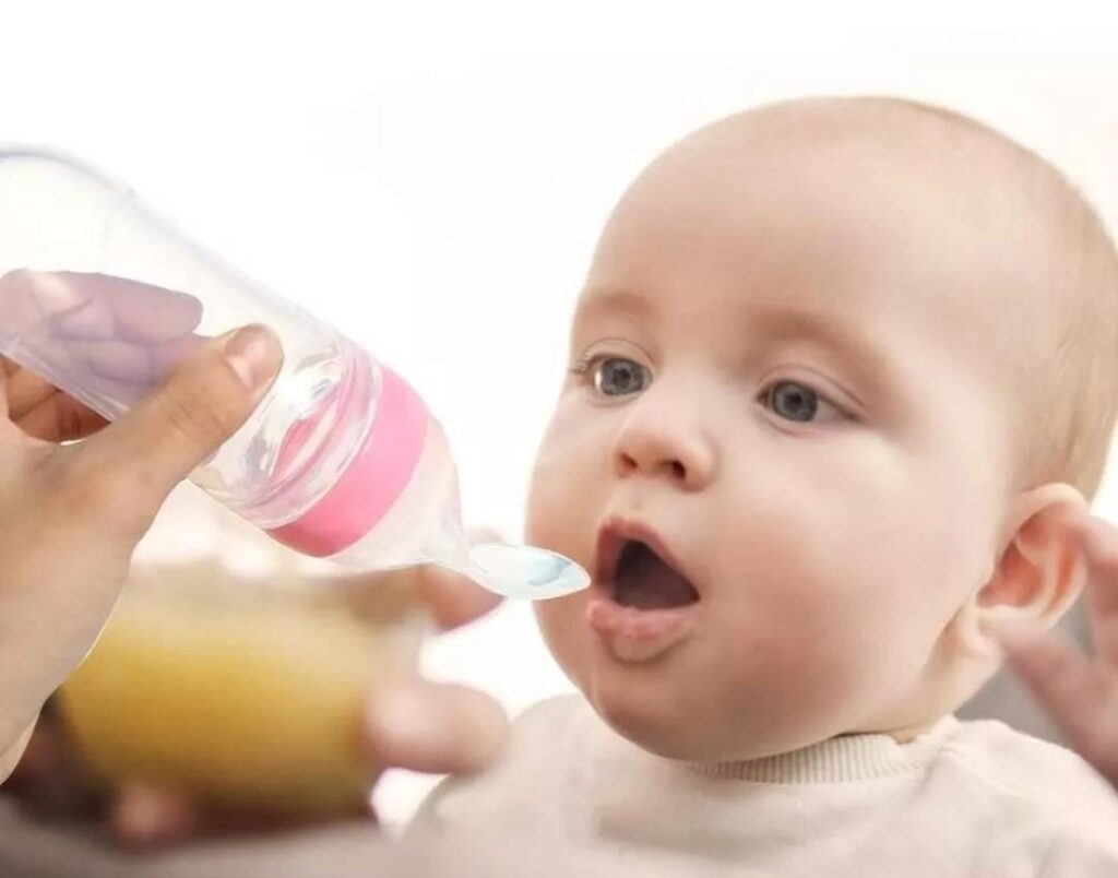 Tetero cuchara para bebes rosado - Mundo Infantil Jeremy Kids
